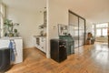 a renovated kitchen with wood floors and a green stove Royalty Free Stock Photo