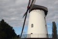 Renovated old white windmill Royalty Free Stock Photo