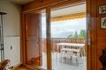 Renovated sliding door to the balcony. Comfort and ergonomic glass system. Laminated profile. Royalty Free Stock Photo