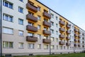 Renovated and thermally insulated facade of a typical 1970s apartment building with balconies