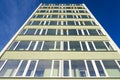 Renovated and thermally insulated facade of a typical 1970s apartment building, cheap city quarter