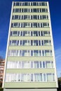 Renovated and thermally insulated facade of a typical 1970s apartment building, cheap city quarter