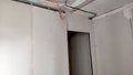 Renovation of the apartment, view of the ceiling, plastered walls