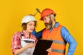 Renovation concept. Couple planning changes renovation apartment. Woman and man wear safety hard hat. Redevelopment of Royalty Free Stock Photo