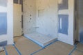 Renovation construction of master bathroom with new under construction bathroom interior drywall ready for tile Royalty Free Stock Photo