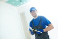 Refurbishment. happy plasterer portrait with tools Royalty Free Stock Photo