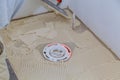 industrial tiler builder worke installing floor tile at repair renovation work Royalty Free Stock Photo