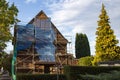 renovation work with scaffolding on a town house