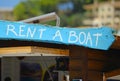 RENT A BOAT wooden sign Royalty Free Stock Photo