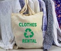 Rent Clothes and recycle clothes icon on fabric bag with hanging clothes to rent Royalty Free Stock Photo