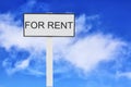 For Rent real estate sign against nice blue sky background with clouds Royalty Free Stock Photo