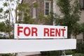 For rent sign with homes in background Royalty Free Stock Photo