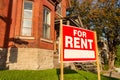 For rent sign posted in front of house