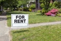 FOR RENT sign posted in lawn Royalty Free Stock Photo