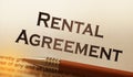 Rental agreement form on desktop in business office showing real estate concept Royalty Free Stock Photo