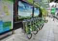 Rental bicycle parking on downtown street in Thailand Royalty Free Stock Photo