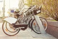 Rental bicycle pick up station in the city street Royalty Free Stock Photo