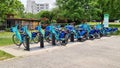 Rental bicycles, blue and green bike parked for tourist for renting for exercise in the outdoor park : April 30, 2021 - Piedmont p