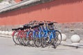 Rental bikes parked near a historical building, Beijing, China