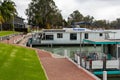 Rental houseboats docked on the foreshore of Renmark in the Riverland South Australia on the 21st June 2020