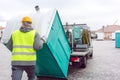 Rental lavatory being loaded on truck