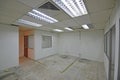 Office lot unit room with partition under renovation, restoration, refurbishment or makeover for carpet installation