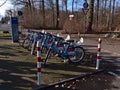 Rental station of Regiorad Stuttgart, a bicycle sharing system, in Degerloch with blue colored bikes. Royalty Free Stock Photo