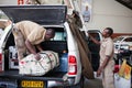 Rental workers are preparing the car for rental