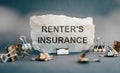 Renter's insurance is shown on a business photo using the text