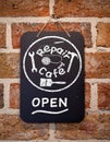 Repair cafe sign on chalk board on cafe wall illustration, consumer repair concept to reduce waste