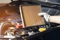 Repair and check car air conditioning system Technician holds car air filter to check cleanliness Clogging dirty or replacing the