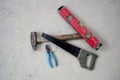 repair concept, repair tools, hammer, hand saw, pliers, construction level Royalty Free Stock Photo