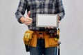 Male builder with tablet pc showing thumbs up Royalty Free Stock Photo