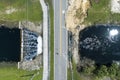 Repair of destroyed bridge after hurricane flood in Florida. Reconstruction of damaged road after flooding water washed Royalty Free Stock Photo