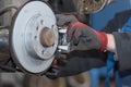 Repair disc brake - hand brake, which have been replaced in the auto repair shop