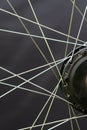 Repair of electric bicycles. Bicycle wheel, spokes and electric motor close-up on a black background Royalty Free Stock Photo