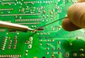 Repair of electronic devices, tin soldering parts Royalty Free Stock Photo