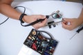 Repair of electronic devices, tin soldering parts Royalty Free Stock Photo