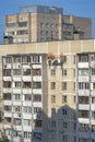 Repair of the facade of the building by workers at a height Royalty Free Stock Photo