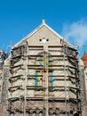 Repair of the facade and roof of an old Lutheran stone church using complicated shaped scaffolding