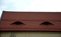 repair of historic roof under reconstruction. fired stress tiles Royalty Free Stock Photo