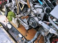 Repair of the internal combustion engine of a passenger car. repair of an open motor gear replacement Royalty Free Stock Photo