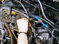 Repair of the internal combustion engine of a passenger car. repair of an open motor gear replacement Royalty Free Stock Photo