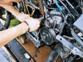 Repair of the internal combustion engine of a passenger car. repair of an open motor gear replacement Royalty Free Stock Photo