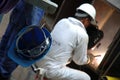 A Repair Man Busy Welding