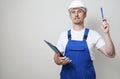 Repair man holding paper clipboard document Royalty Free Stock Photo