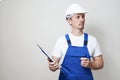 Repair man holding paper clipboard document Royalty Free Stock Photo