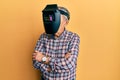 Repair man wearing professional welding mask over head covering face for protection Royalty Free Stock Photo