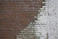 Repair of old brick wall with new white stones White stone wall and plastered red brick wall for background or texture Masonry wit Royalty Free Stock Photo