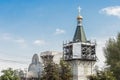 Repair, restoration or construction of a new church in the city against the blue sky Royalty Free Stock Photo